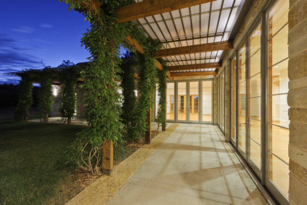 outdoor walkway on a modern home with impact windows