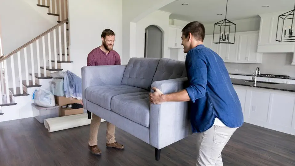 furniture being moved through sliding glass door