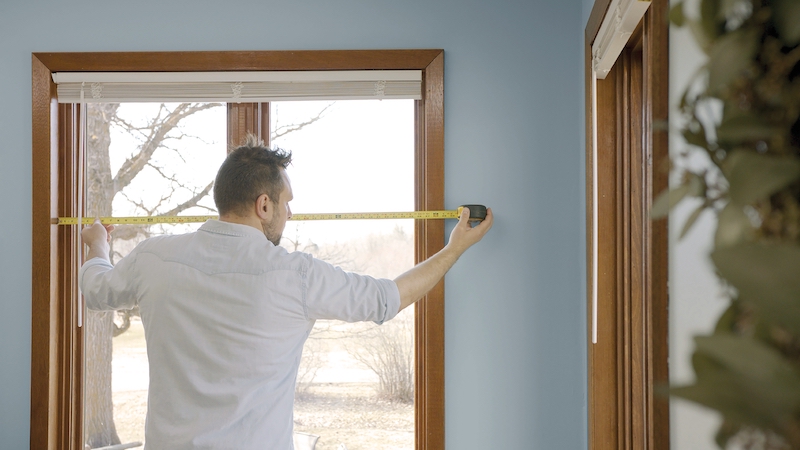 replacement window being measured